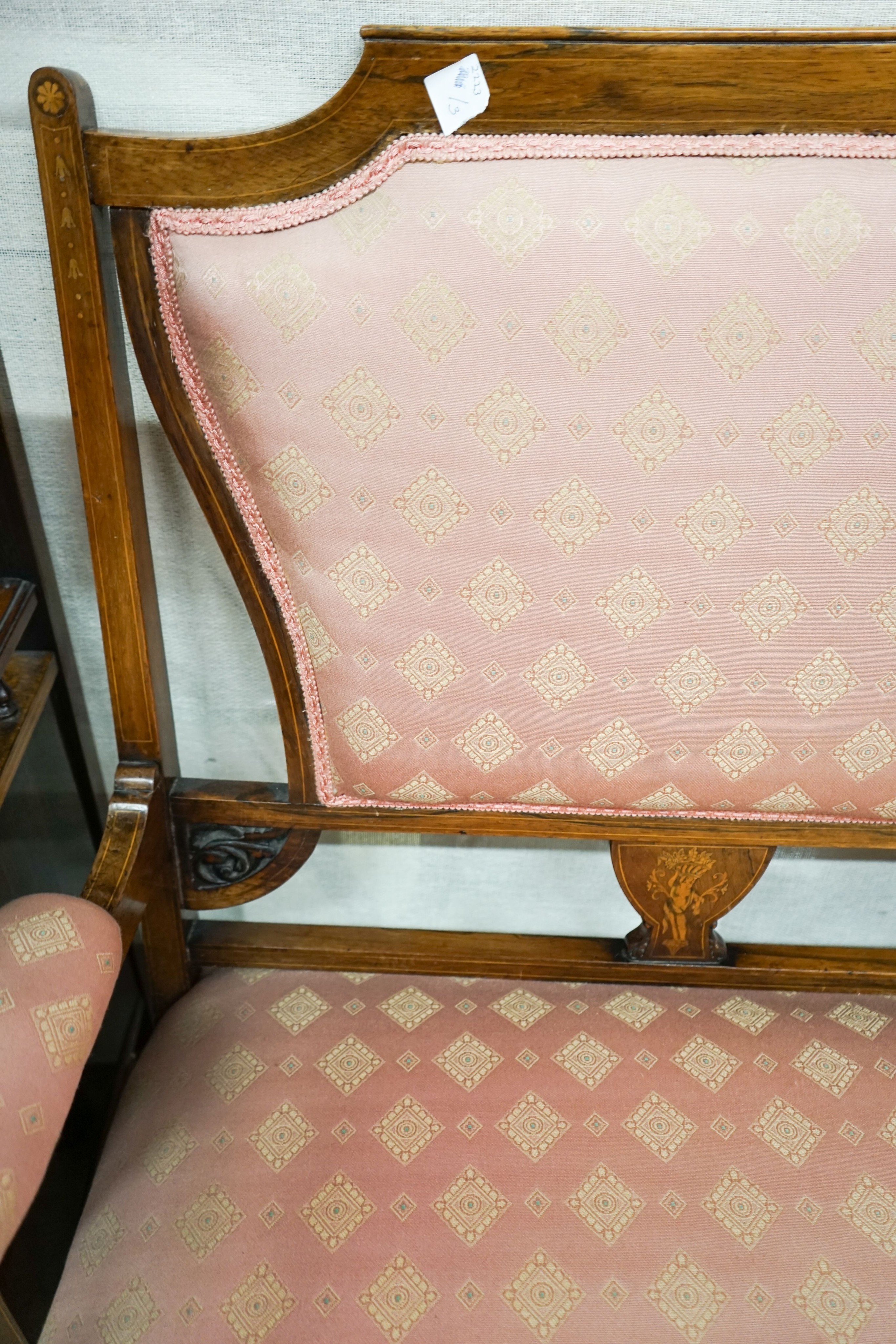 A late Victorian marquetry inlaid rosewood salon settee, length 144cm, depth 60cm, height 90cm